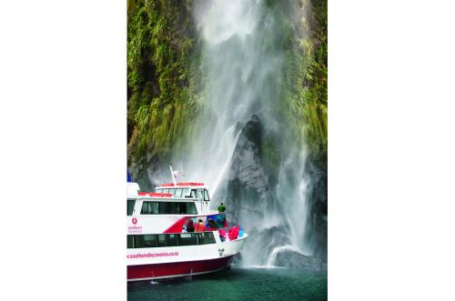 Milford Sound Nature Cruise at a waterfall